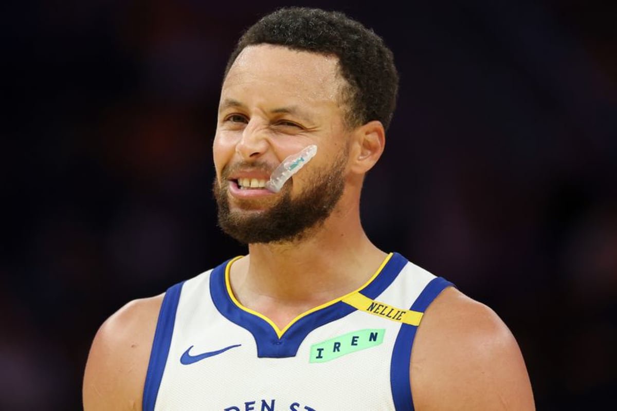 Stephen Curry reacts after a play