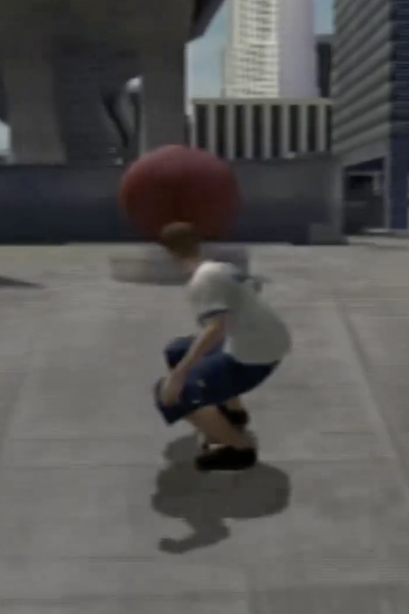 Tony Hawk skating near a large red ball at Pershing Square.
