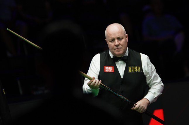 TAIYUAN, CHINA - AUGUST 11: John Higgins of Scotland reacts in the first round match against Stuart Bingham of England on day 4 of the 2026 World Snooker Tour China Open at Taiyuan Binhe Sports Center on August 11, 2026 in Taiyuan, Shanxi Province of China. (Photo by Tai Chengzhe/VCG via Getty Images)