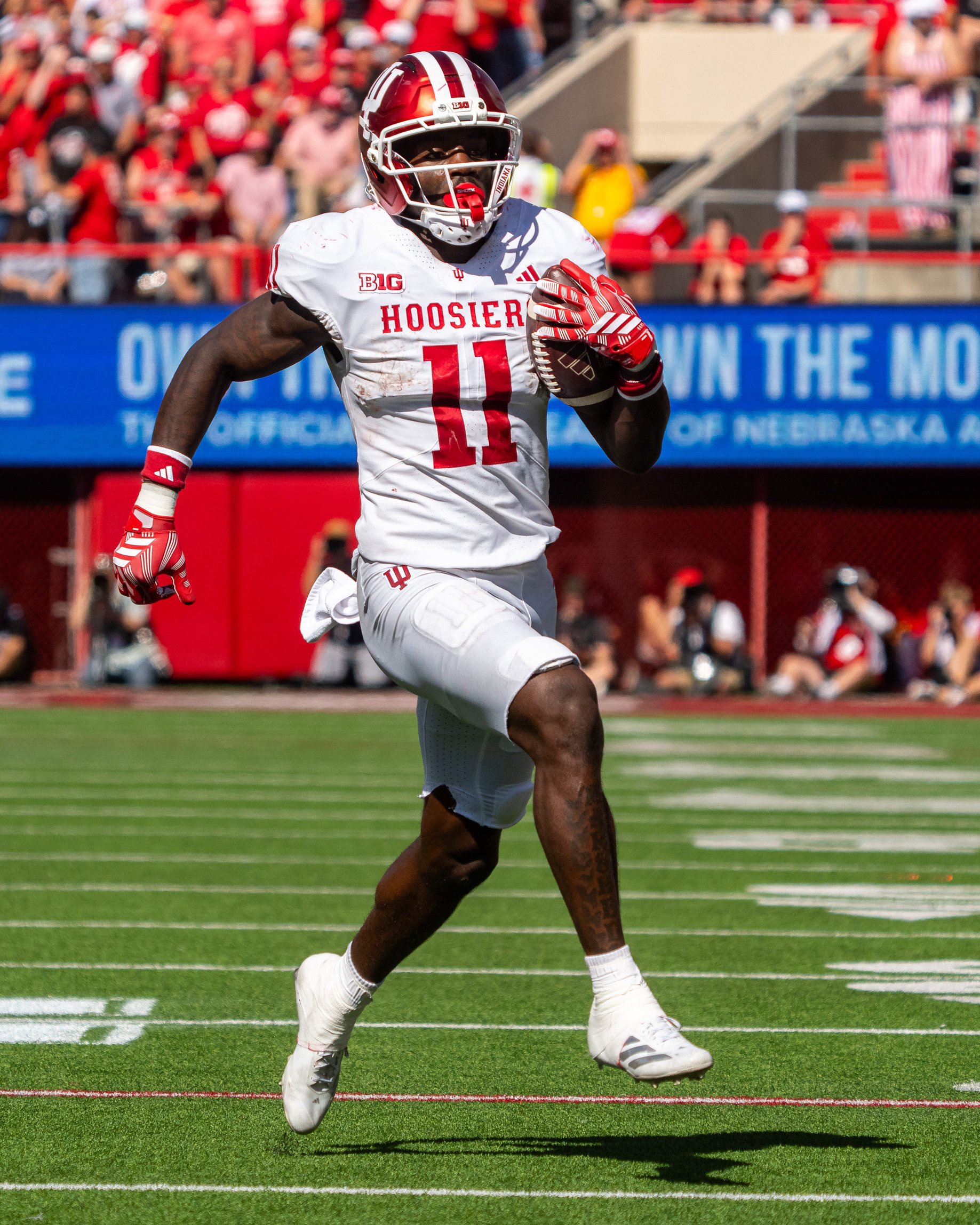 Indiana Hoosiers wide receiver Nick Marsh (11) runs after a catch for a touchdown against the Nebraska Cornhuskers during the fourth quarter at Memorial Stadium in Lincoln, Nebraska, on Oct. 10, 2026.