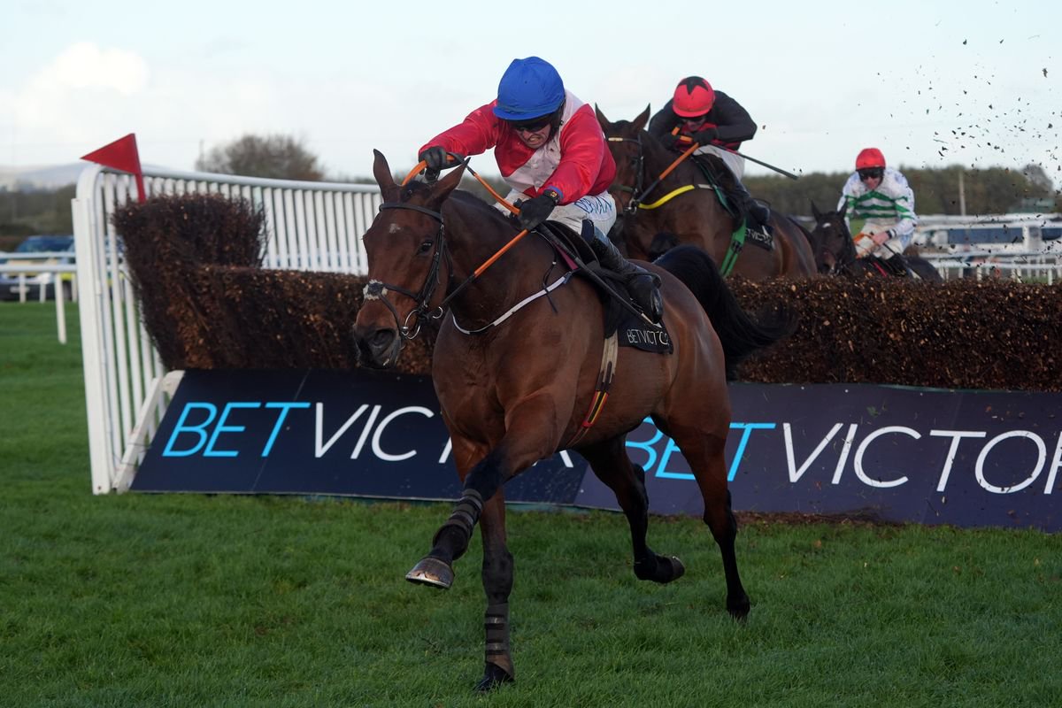 Envoi Allen ridden by jockey Darragh O’Keeffe on the way to winning the Champion Chase at Down Royal in 2025