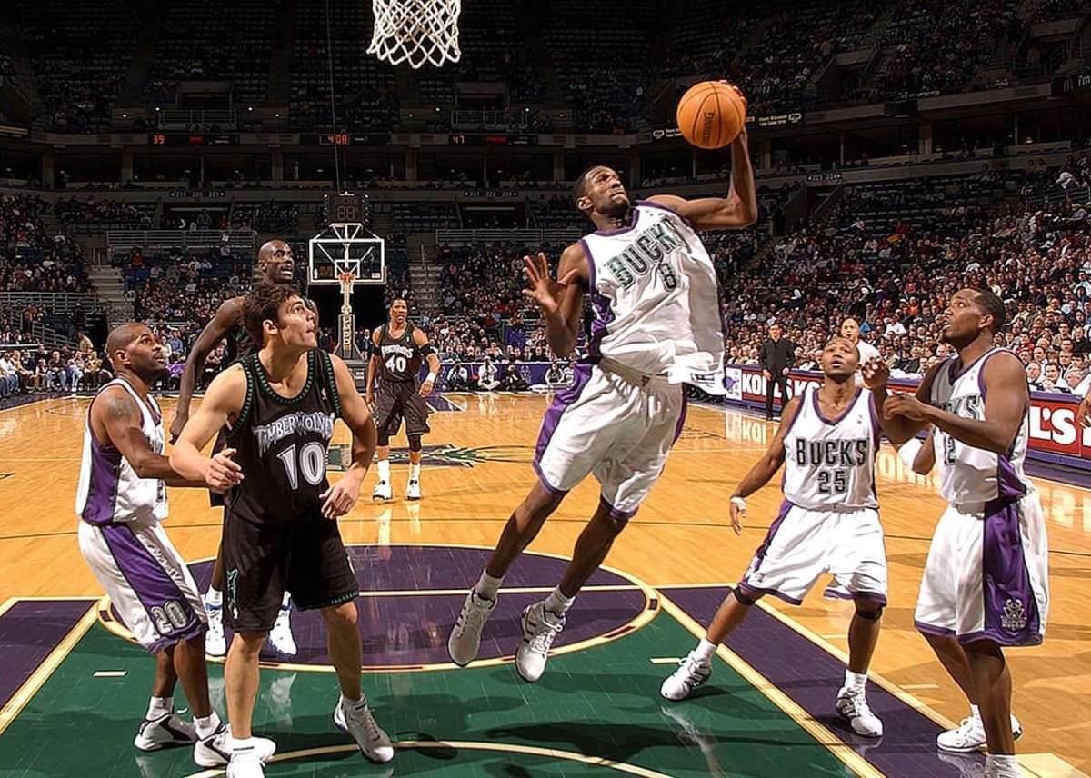 Milwaukee Bucks' #8 Joe Smith grabbing a rebound in front of teammate Michael Redd #22 and Wally Szczerbiak #10 of the Minnesota Timberwolves during their game at Bradley Center in Milwaukee, Wisconsin, USA. - Jonathan Daniel // Getty Images 