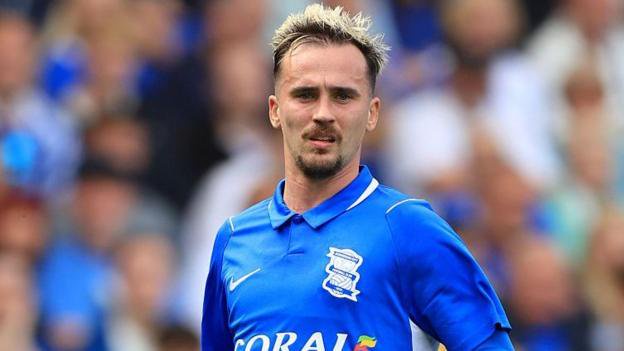 Liam Millar watches the ball while playing for Birmingham City.