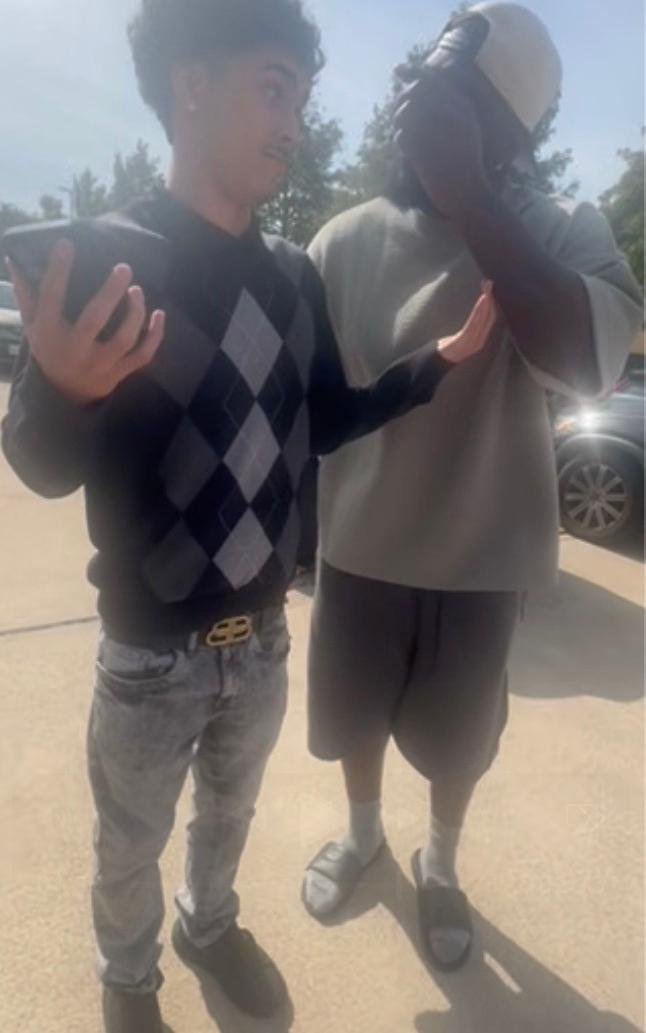 Dez Bryant confronting a teenager in a parking lot.