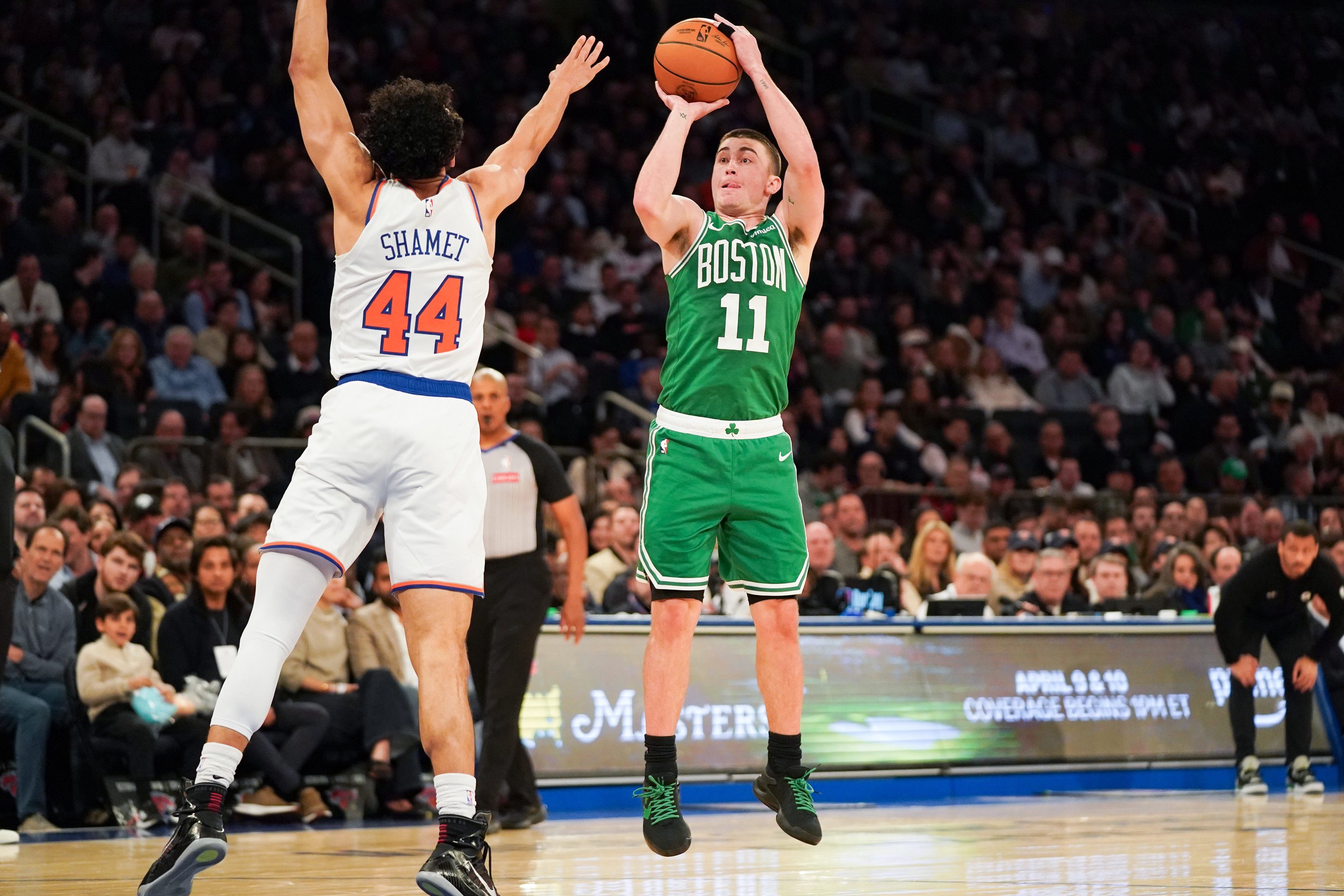 Apr 9, 2026; New York, New York, USA; Boston Celtics guard Payton Pritchard (11) shoots over New York Knicks guard Landry Shamet (44) during the fourth quarter at Madison Square Garden. Mandatory Credit: Lucas Boland-Imagn Images