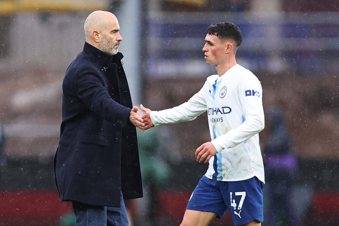 Enzo Maresca and Phil Foden shake hands.