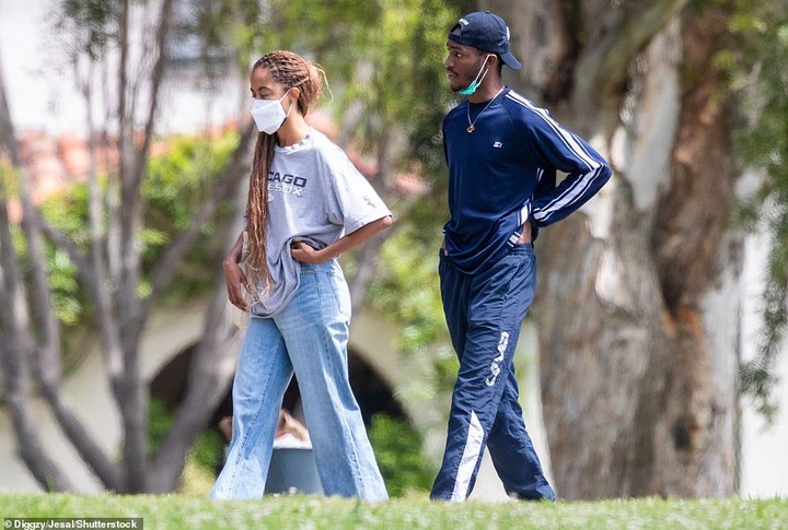Both Malia and Clifton were dressed casually for the outing; the former First Daughter paid tribute to her mother Michelle's hometown of Chicago, wearing an oversized Chicago White Sox T-shirt with a pair of baggy jeans