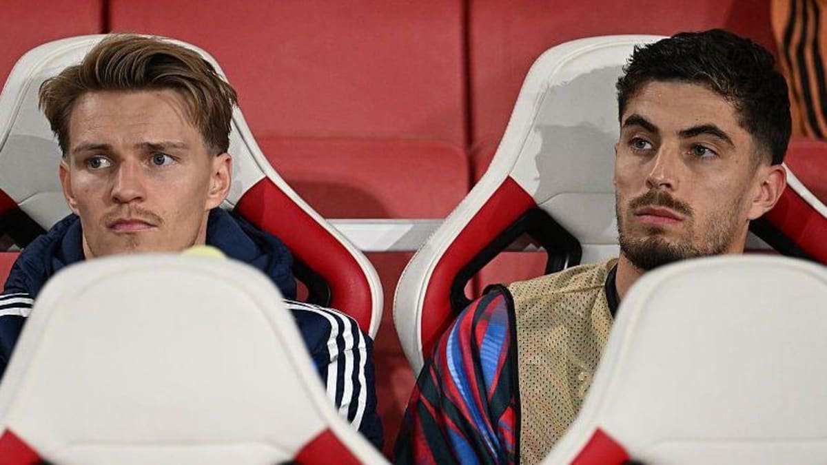 Martin Odegaard and Kai Havertz of Arsenal look on from the bench