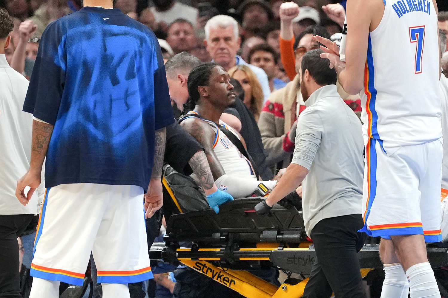 Image: Oklahoma City Thunder guard Jalen Williams is taken off the court via a stretcher by medical staff  (Kyle Phillips / AP)