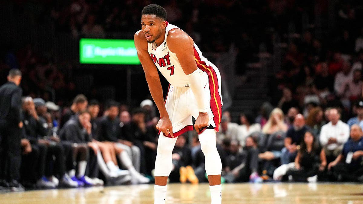 Giannis Antetokounmpo stands during a break in the game at Kaseya Center.