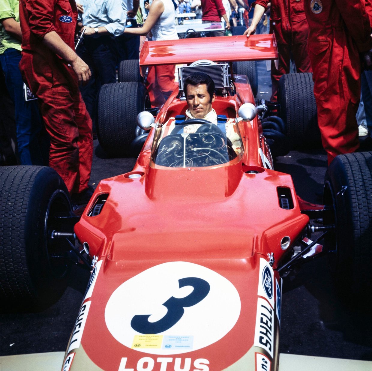 Mario Andretti in the pit lane during the German GP in 1969