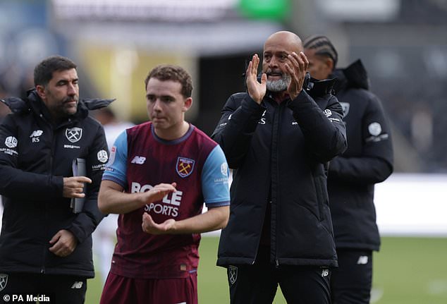 West Ham manager Nuno Espirito Santo (right) applauds the fans after their 1-0 Championship win at Swansea (Steven Paston/PA)