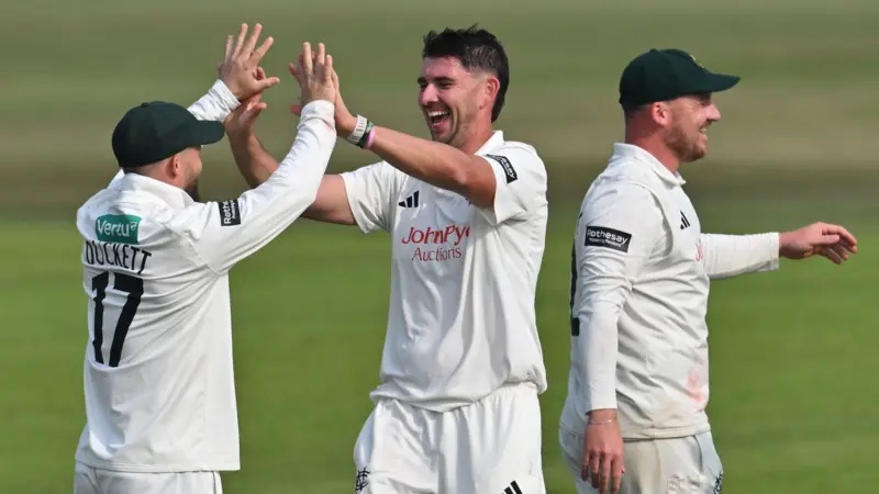 Nottinghamshire's Josh Tongue celebrates a wicket with team-mate Ben Duckett