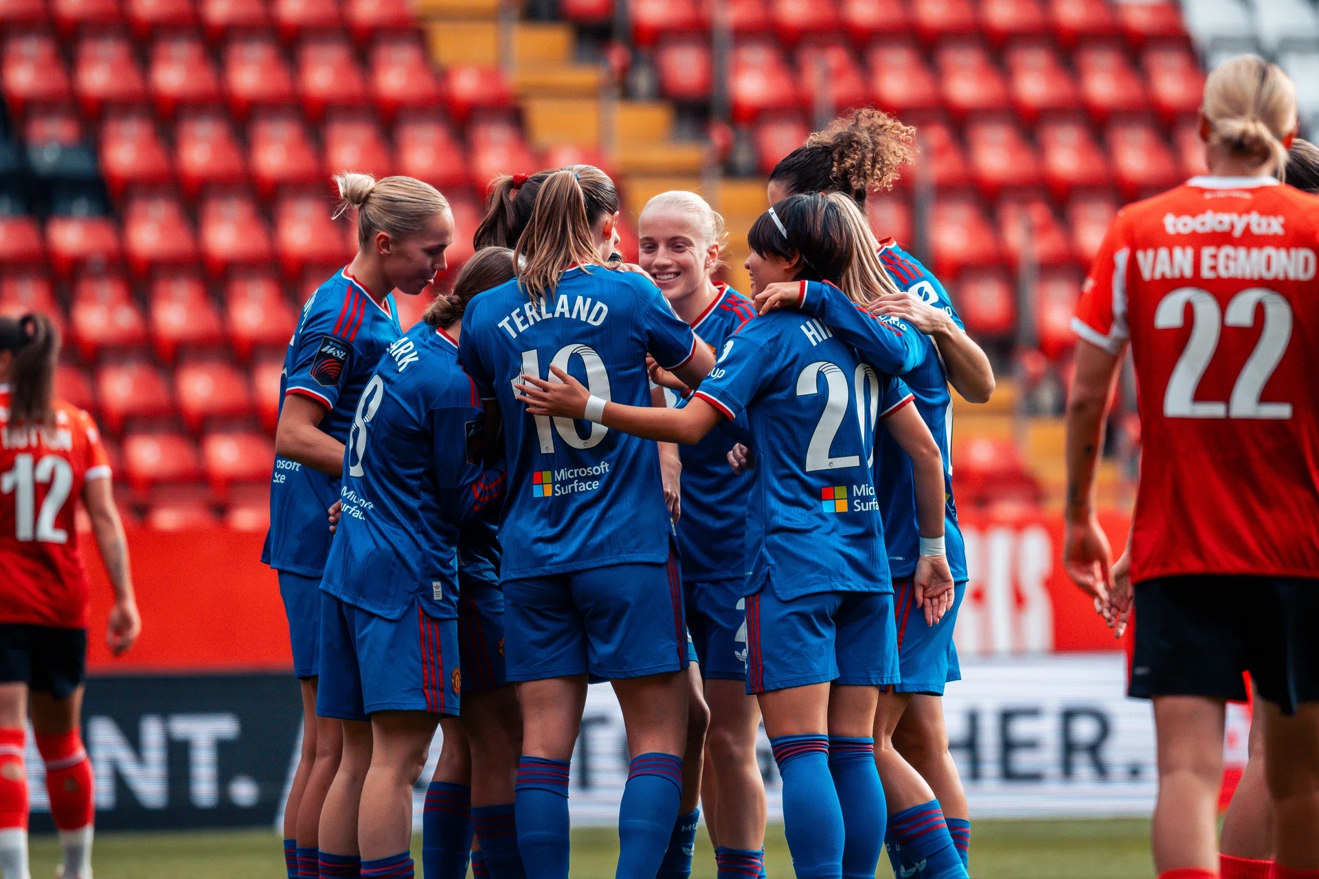 United Women celebrate goal at Charlton