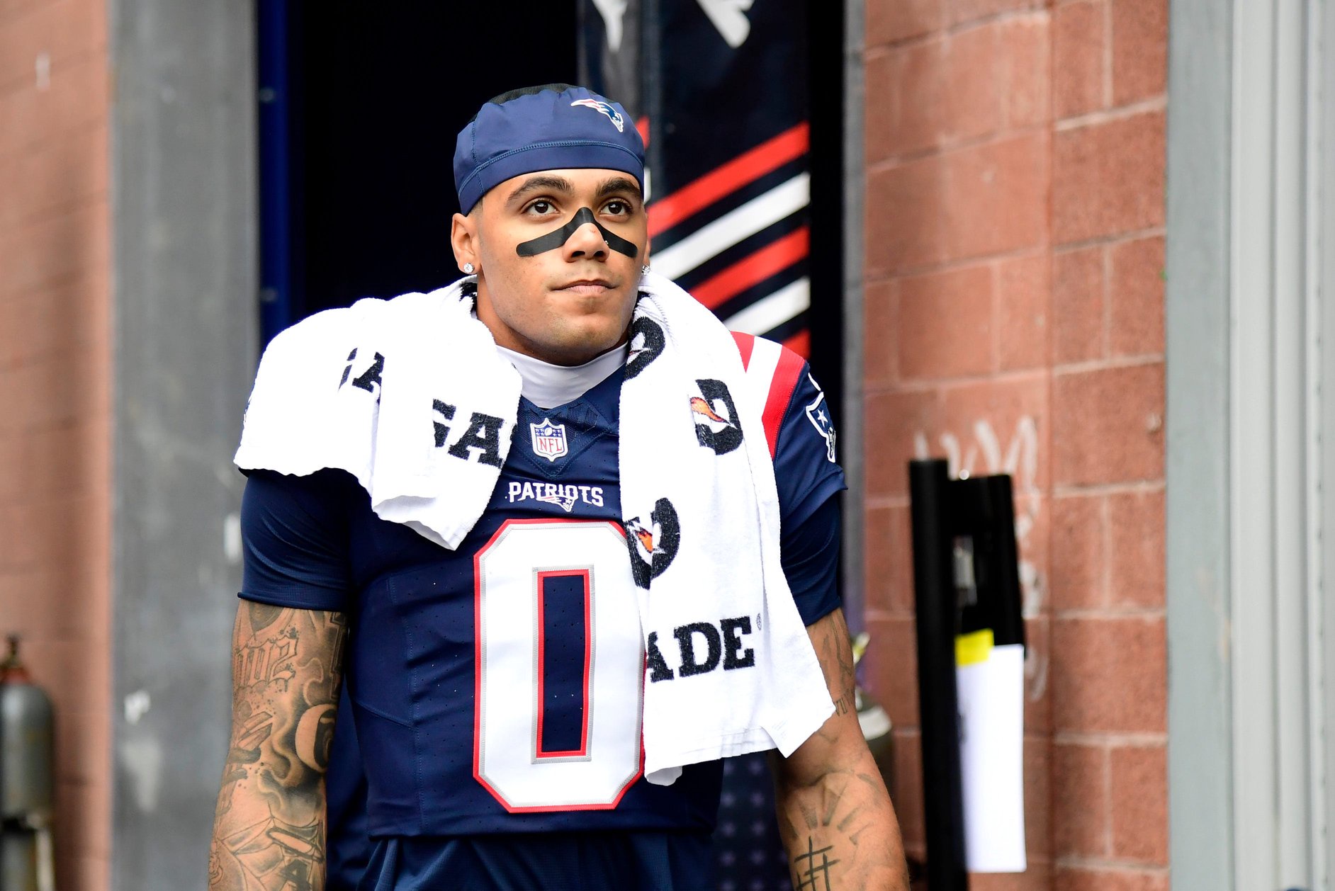 Sep 20, 2026; Foxborough, Massachusetts, USA;  New England Patriots cornerback Christian Gonzalez (0) looks on prior to the game against the Pittsburgh Steelers at Gillette Stadium.  Mandatory Credit: Bob DeChiara-Imagn Images