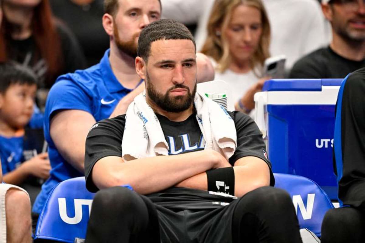Mar 30, 2026; Dallas, Texas, USA; Dallas Mavericks guard Klay Thompson (31) looks on from the bench during the second half against the Minnesota Timberwolves at the American Airlines Center. © Jerome Miron-Imagn Images