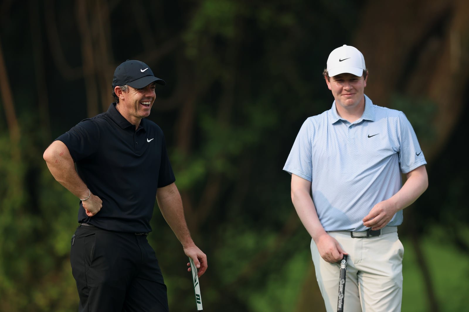 Rory McIlroy and Scotland’s Robert MacIntyre on the 16th green on day one of the DP World India Championship at Delhi Golf Club. Photograph: Luke Walker/Getty images