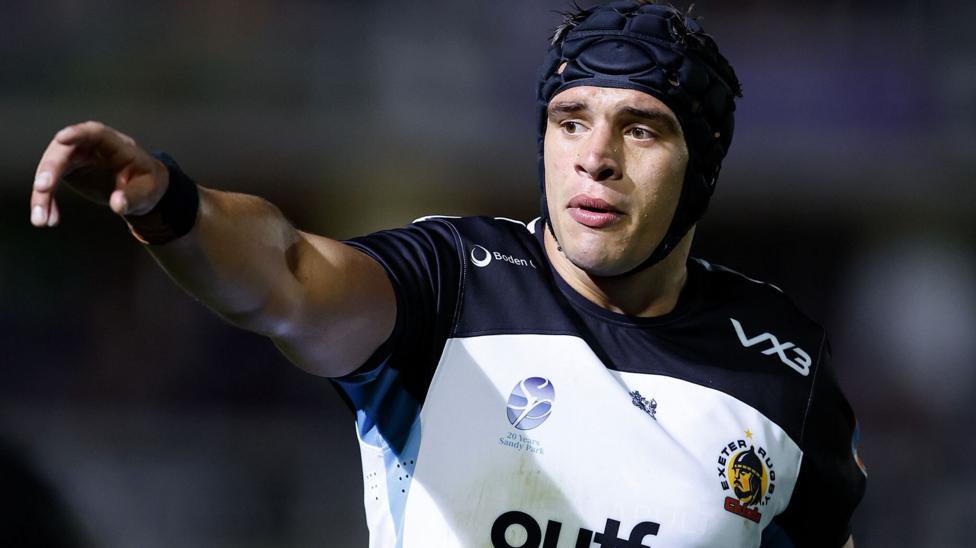 Dafydd Jenkins, wearing a scrum cap, points during a game for Exeter Chiefs