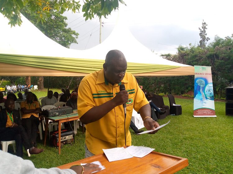 Omboko Milemba addresses teachers during their annual general meeting at Kima mission on Sunday, October 23, 2022.