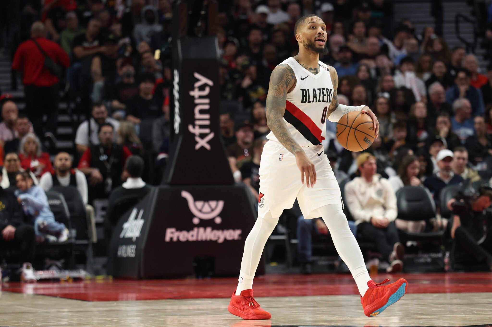 Oct 7, 2026; Portland, Oregon, USA; Portland Trail Blazers guard Damian Lillard (0) brings the ball up the court against the Golden State Warriors during the first half at Moda Center. Mandatory Credit: Jaime Valdez-Imagn Images