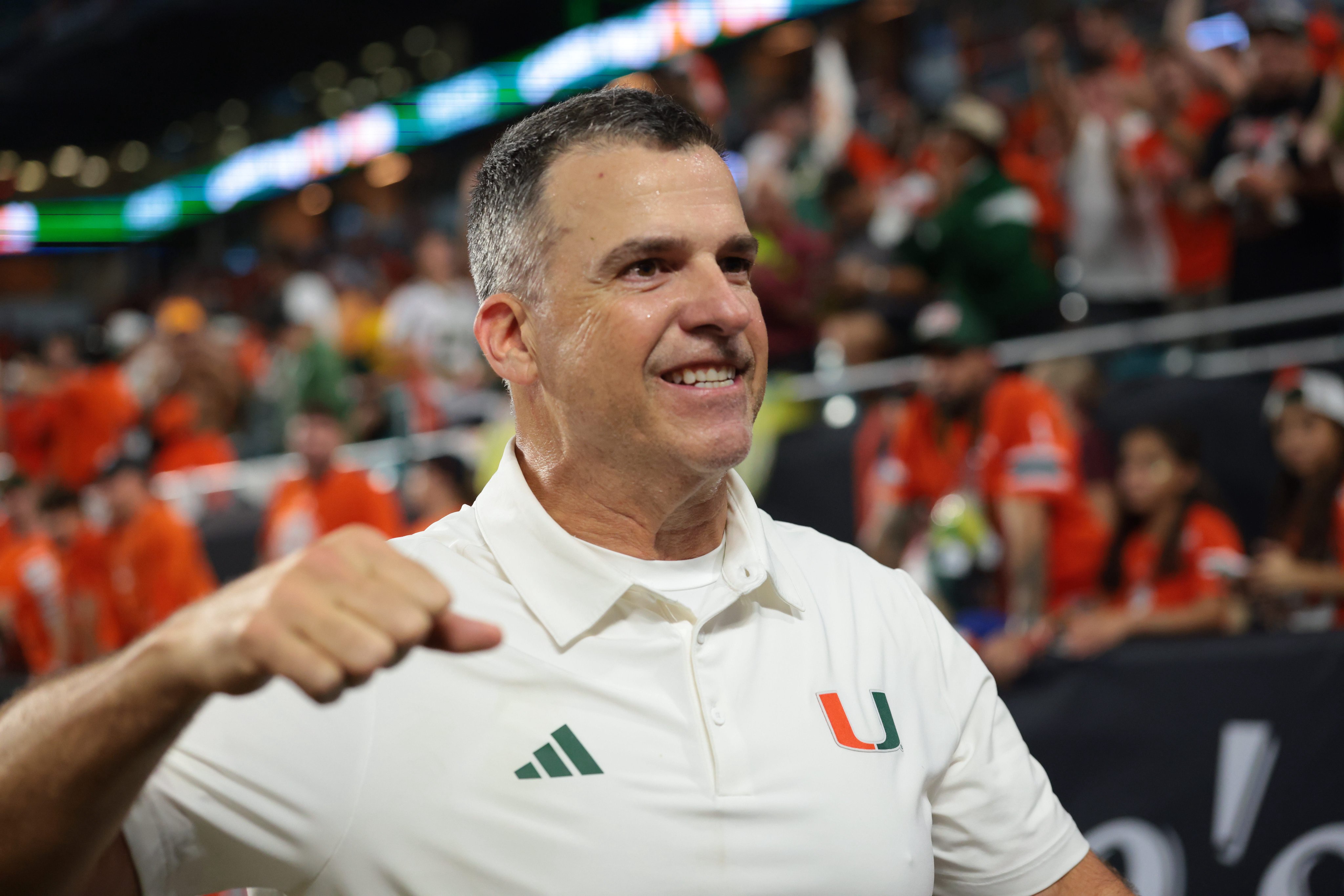Oct 17, 2026; Miami Gardens, Florida, USA;  Miami Hurricanes head coach Mario Cristobal celebrates after defeating the Florida State Seminoles at Hard Rock Stadium.  Mandatory Credit: Sam Navarro-Imagn Images