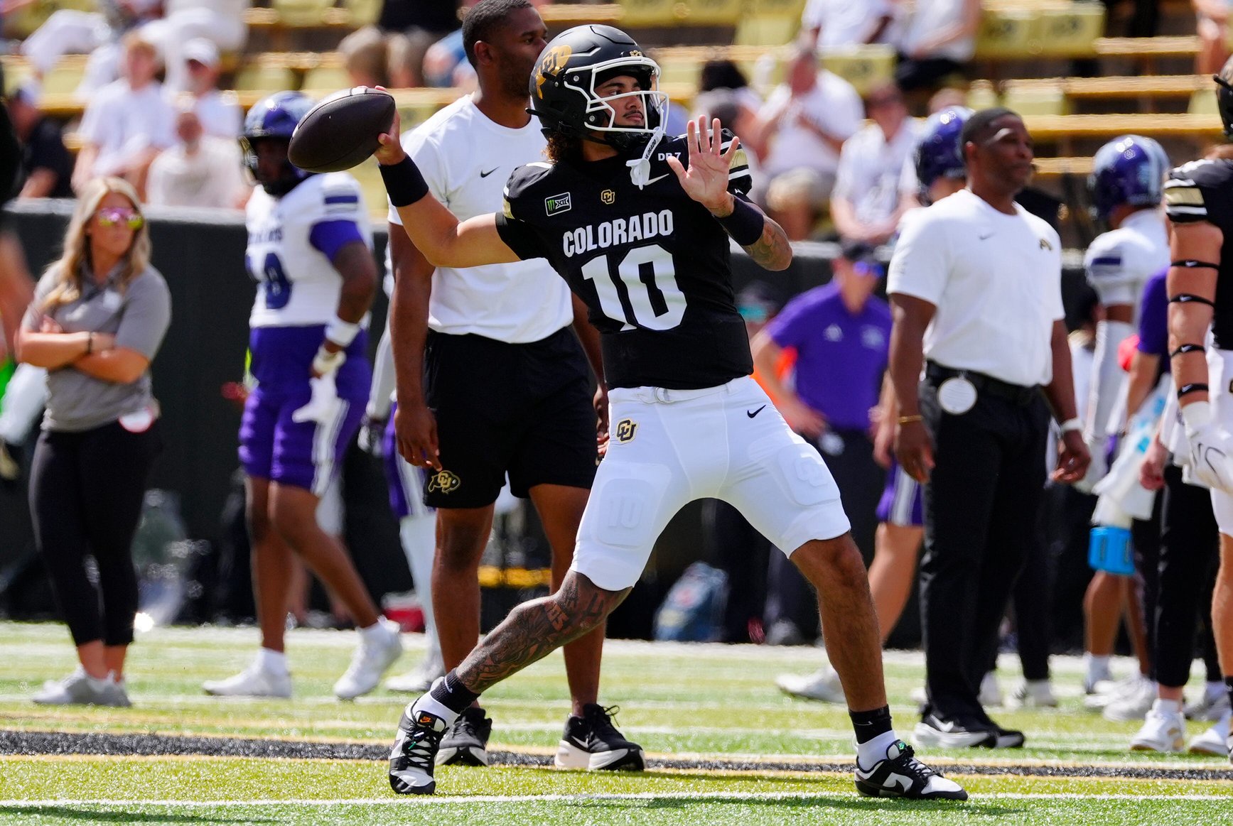 Sep 12, 2026; Boulder, Colorado, USA;  Colorado Buffaloes quarterback Julian Lewis (10) warms up before the game against Weber State at Folsom Field.  Mandatory Credit: Ron Chenoy-Imagn Images
