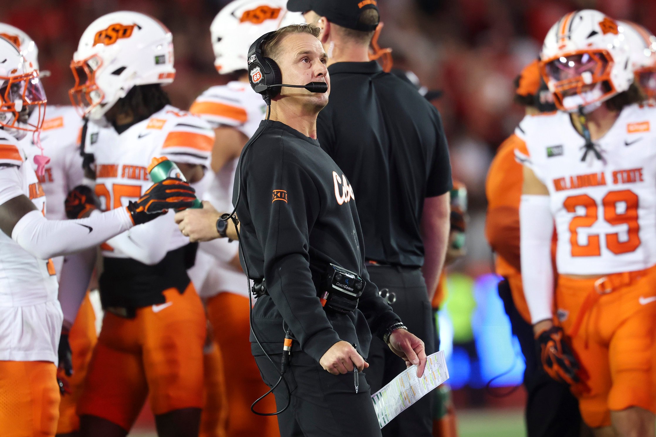 Oct 17, 2026; Houston, Texas, USA; Oklahoma State Cowboys head coach Eric Morris looks up during the fourth quarter against the Houston Cougars at TDECU Stadium. Mandatory Credit: Troy Taormina-Imagn Images