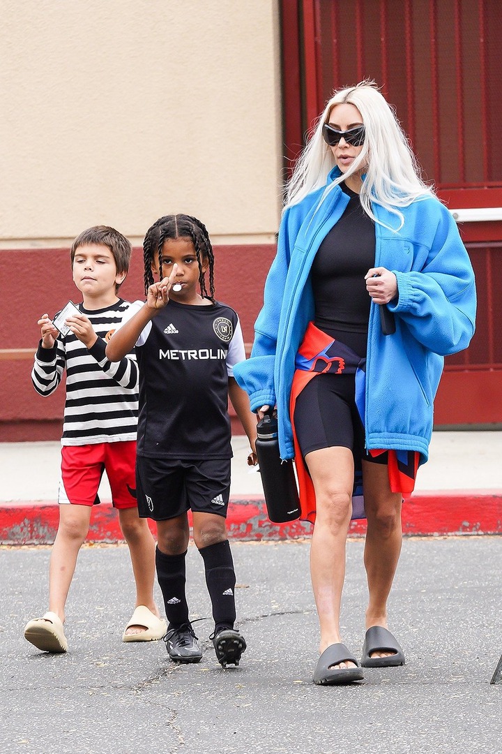Kim Kardashian looked cool and relaxed as she left her son's soccer game after would-be intruder nearly made his way into her home this weekend