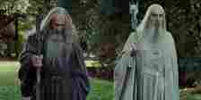 Gandalf the Grey and Saruman the White walk together in Lord of the Rings