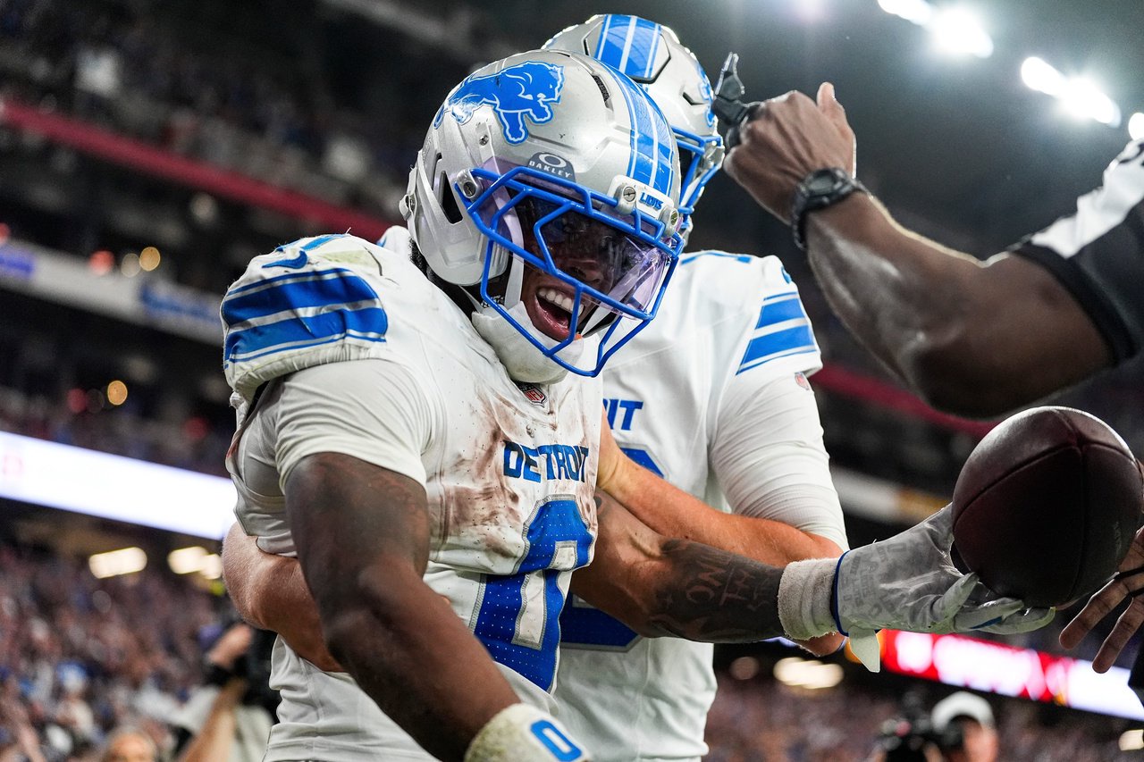 Detroit Lions running back Jahmyr Gibbs (0) celebrates a touchdown against Arizona Cardinals with quarterback Jared Goff (16)  during the second half at State Farm Stadium in Glendale, Arizona on Sunday, Oct. 11, 2026.
