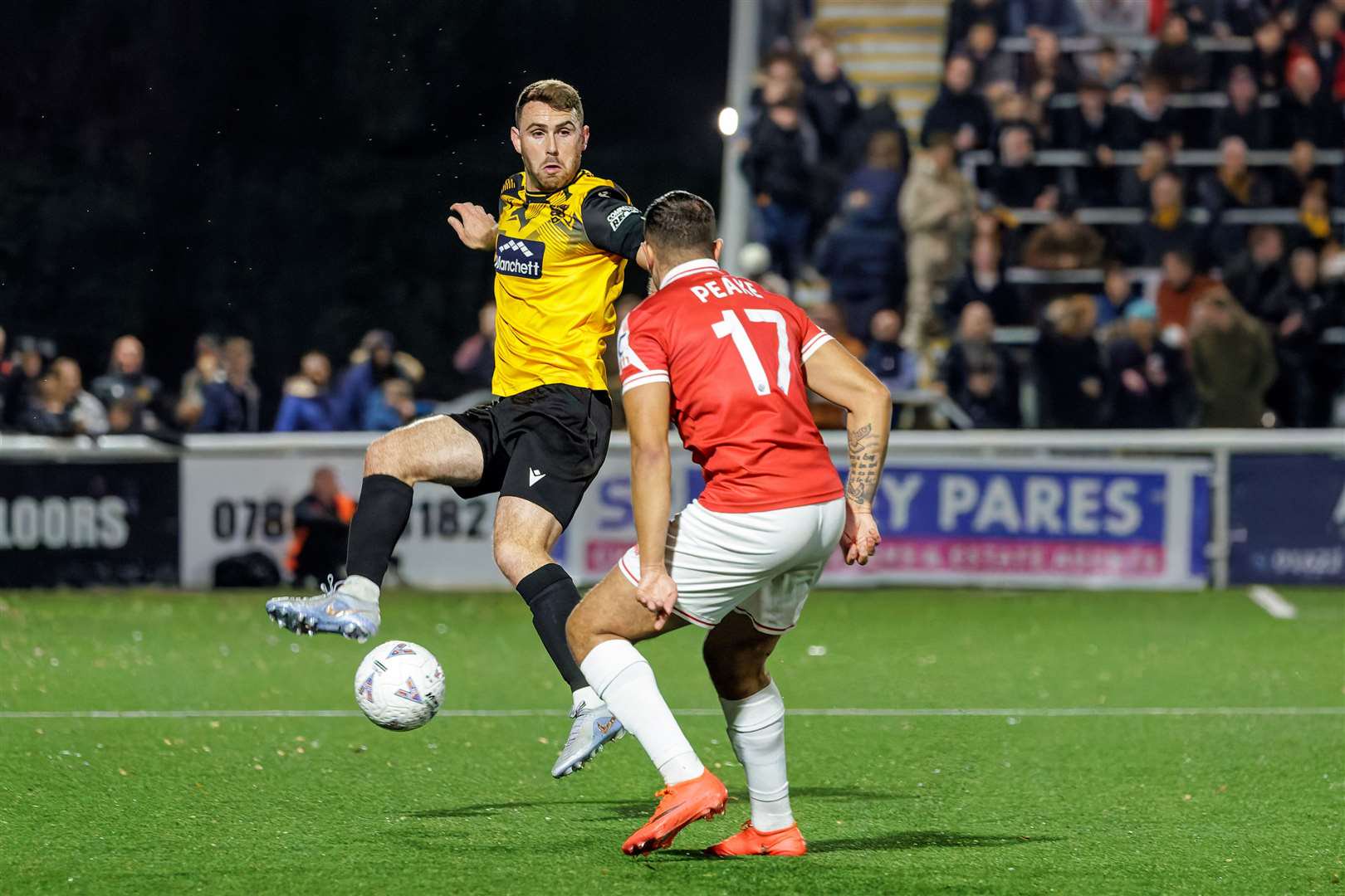 Maidstone skipper George Fowler has Ebbsfleet's Lennon Peake for company. Picture: Helen Cooper