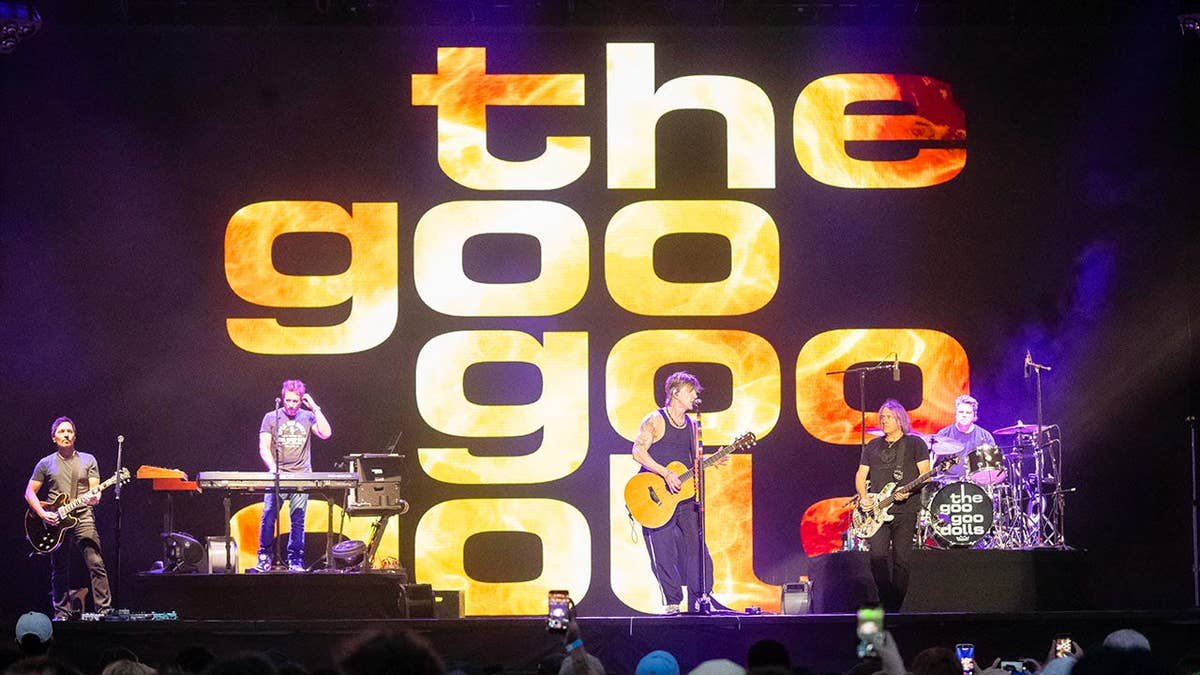The Goo Goo Dolls performing on stage during a festival