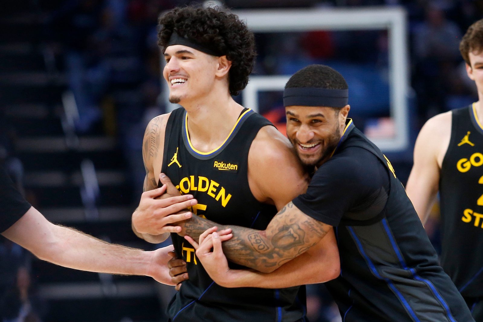 Feb 25, 2026; Memphis, Tennessee, USA; Golden State Warriors guard Gary Payton II (0) embraces with forward Gui Santos (15) during the second half against the Memphis Grizzlies at FedExForum. Mandatory Credit: Petre Thomas-Imagn Images