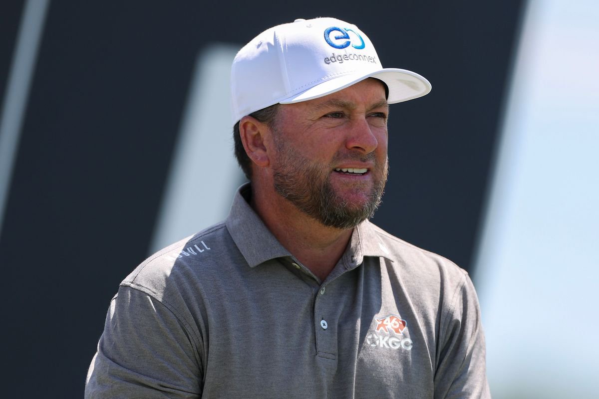 Graeme McDowell looks on