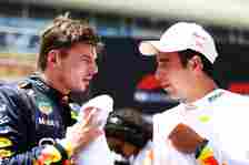 Sprint winner Max Verstappen of the Netherlands and Oracle Red Bull Racing talks with Third placed Sergio Perez of Mexico and Oracle Red Bull Racin...