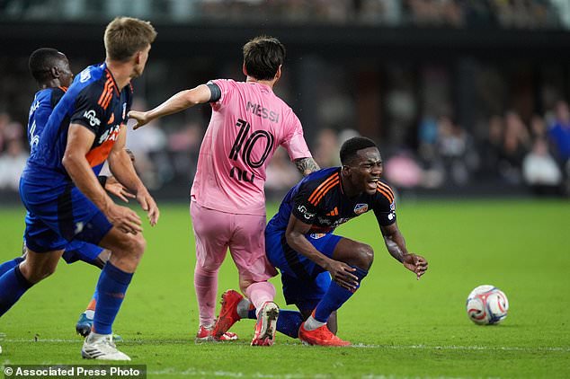 Inter Miami forward Lionel Messi (10) incurs a yellow card in a clash with FC Cincinnati midfielder Samuel Gidi (11), right, during the first half of an MLS soccer match, Wednesday, Oct. 28, 2026, in Miami. (AP Photo/Rebecca Blackwell)