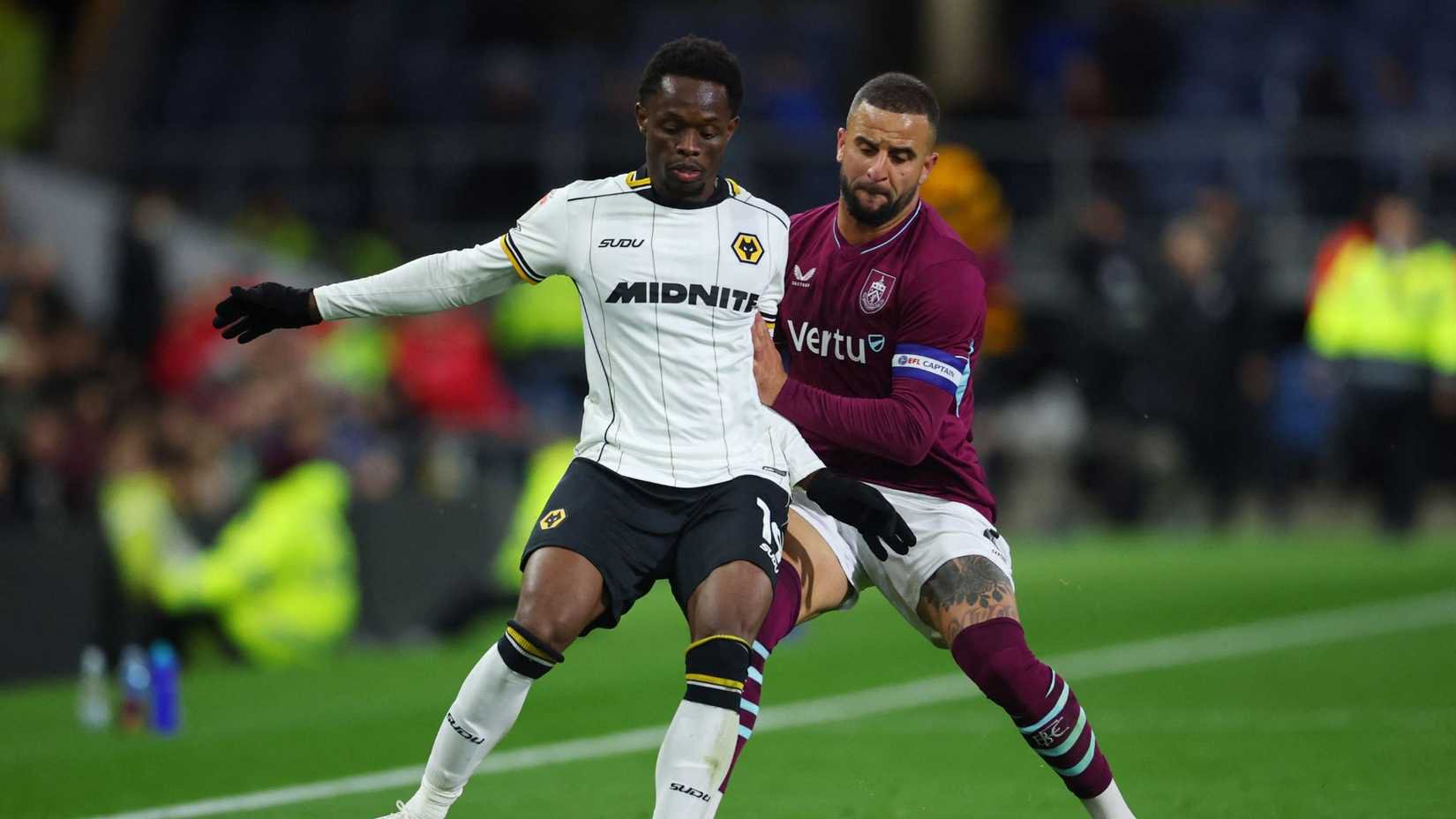 Rafiki Said of Wolves battles with Burnley's Kyle Walker. 