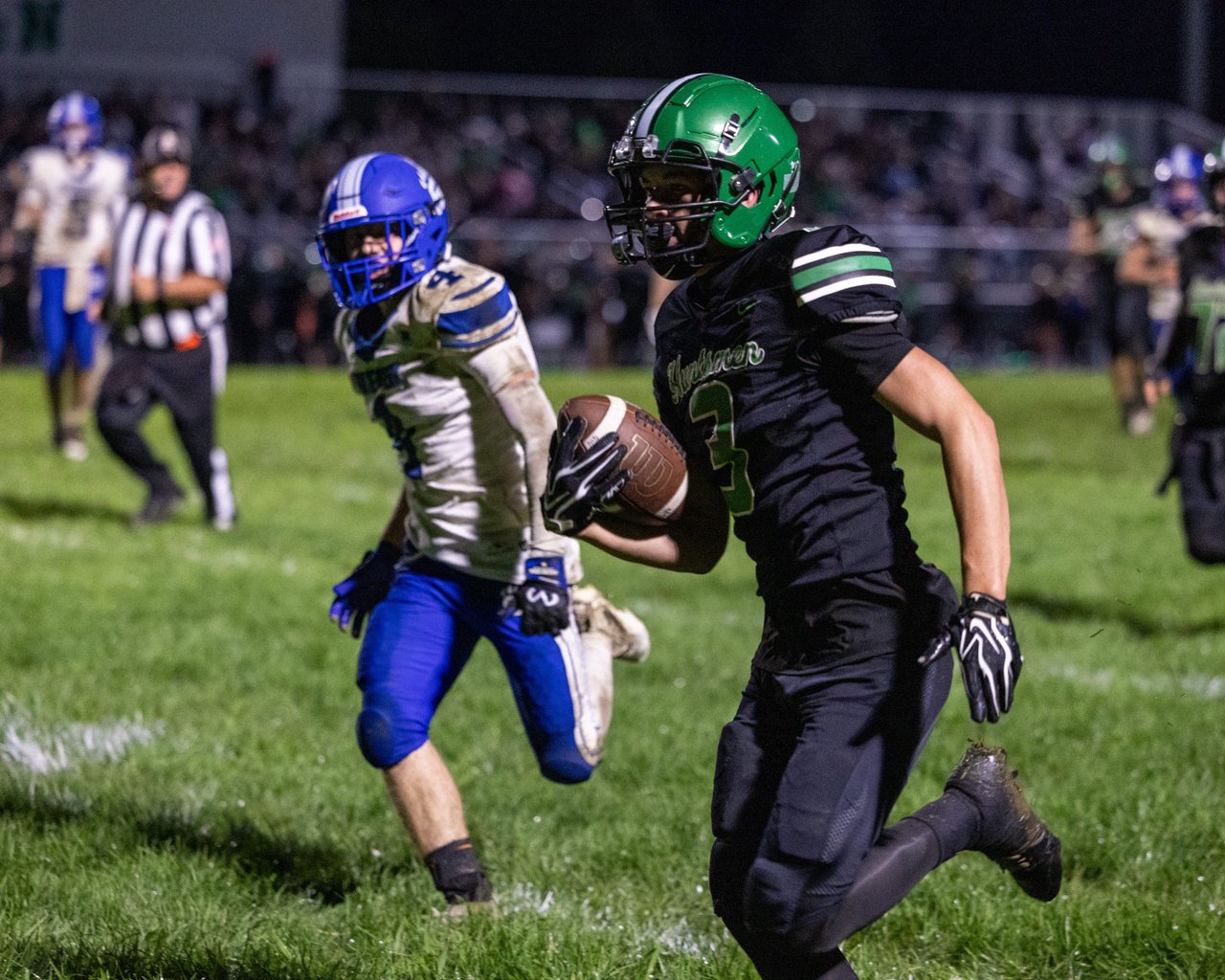 Huntington's Zayden Baker runs with the football during a 47-24 win over Southeastern on Sept. 25, 2026.