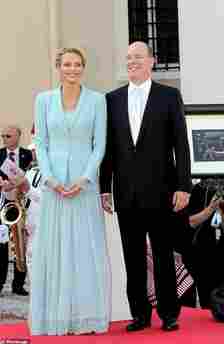 Prince Albert and Princess Charlene beam outside the Prince's Palace in Monaco after their civil ceremony on July 1, 2011