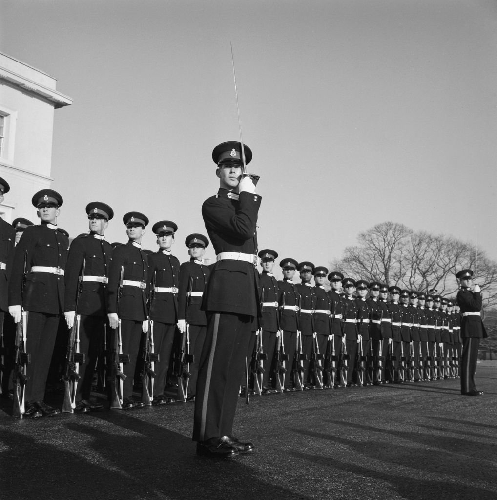 Prince Michael of Kent and military personnel commissioned into the 11th Hussars Cavalry Regiment at the 'passing out' ceremony of Mons Officer Cadet School