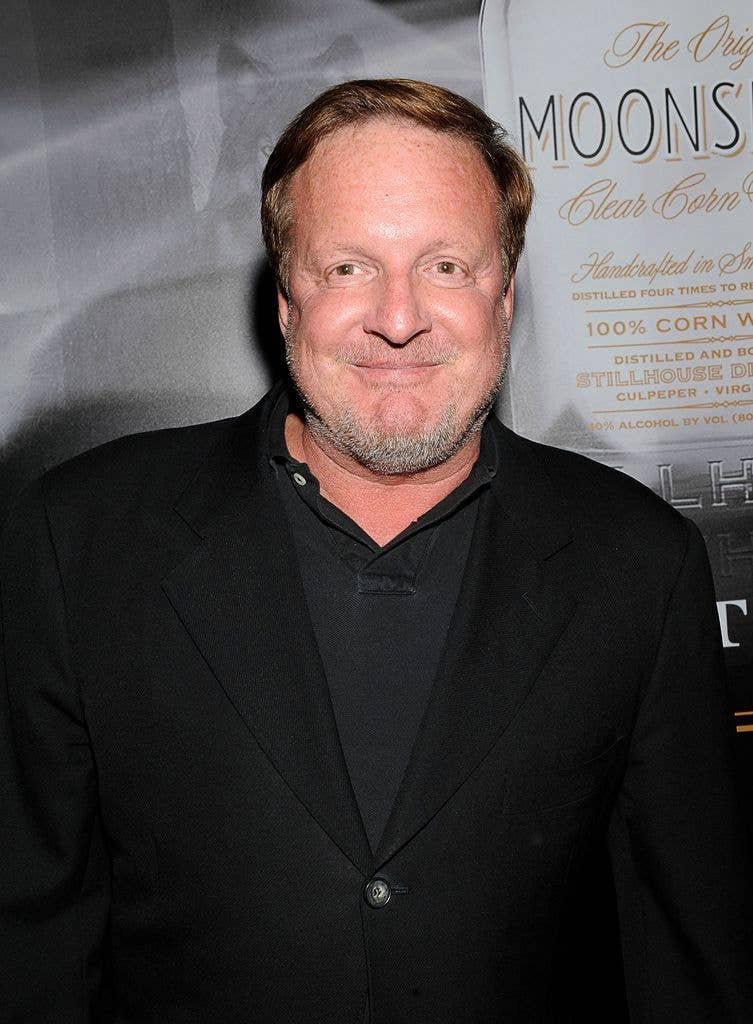 Ron Burkle in black jacket and top