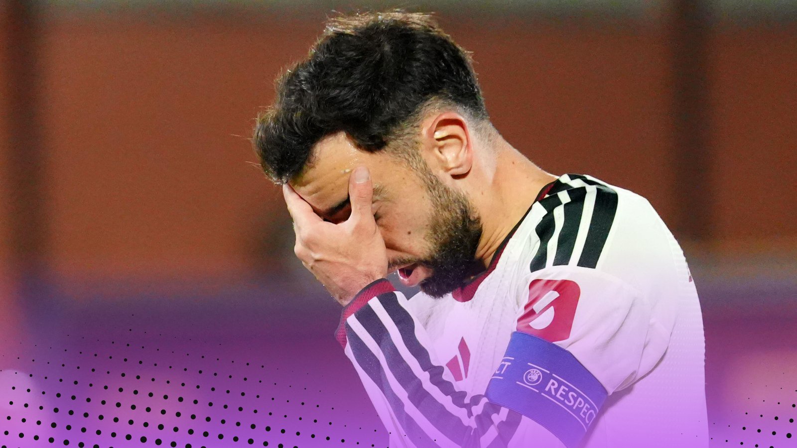 Bruno Fernandes with his head in his hands.