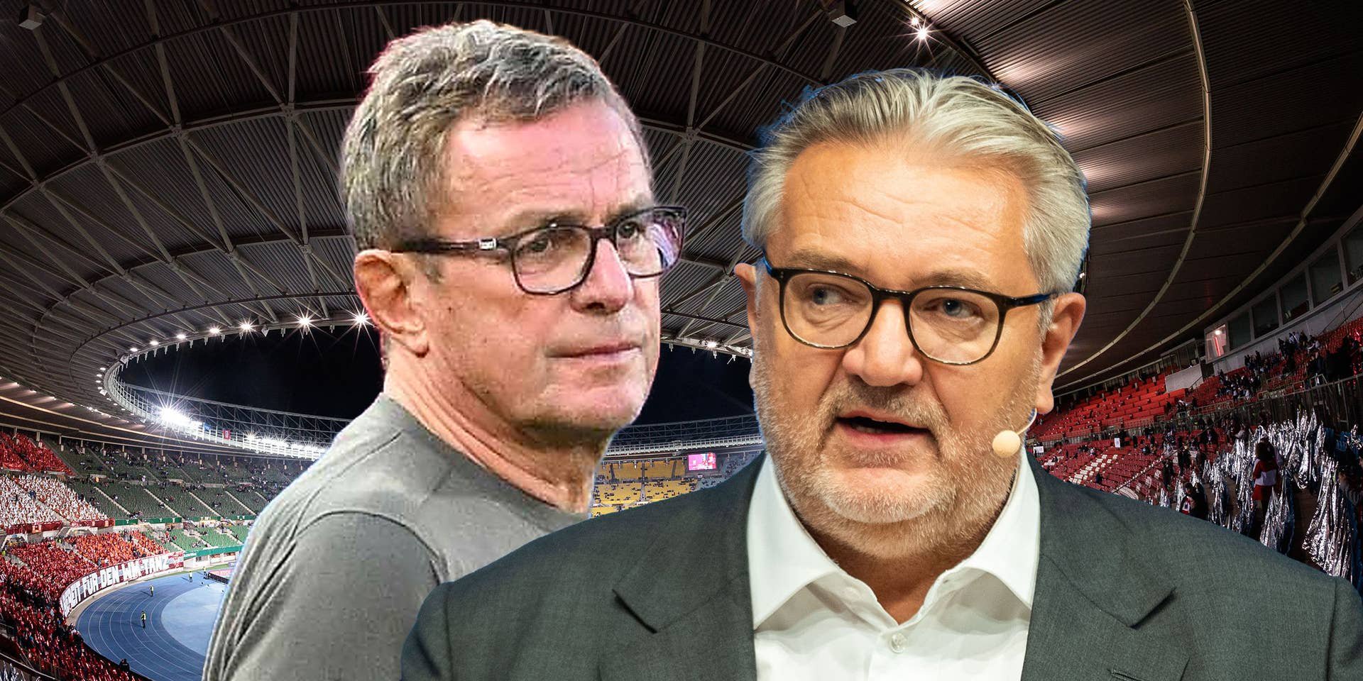 Zwei Männer mit Brillen im Vordergrund, im Hintergrund ein beleuchtetes Fußballstadion.