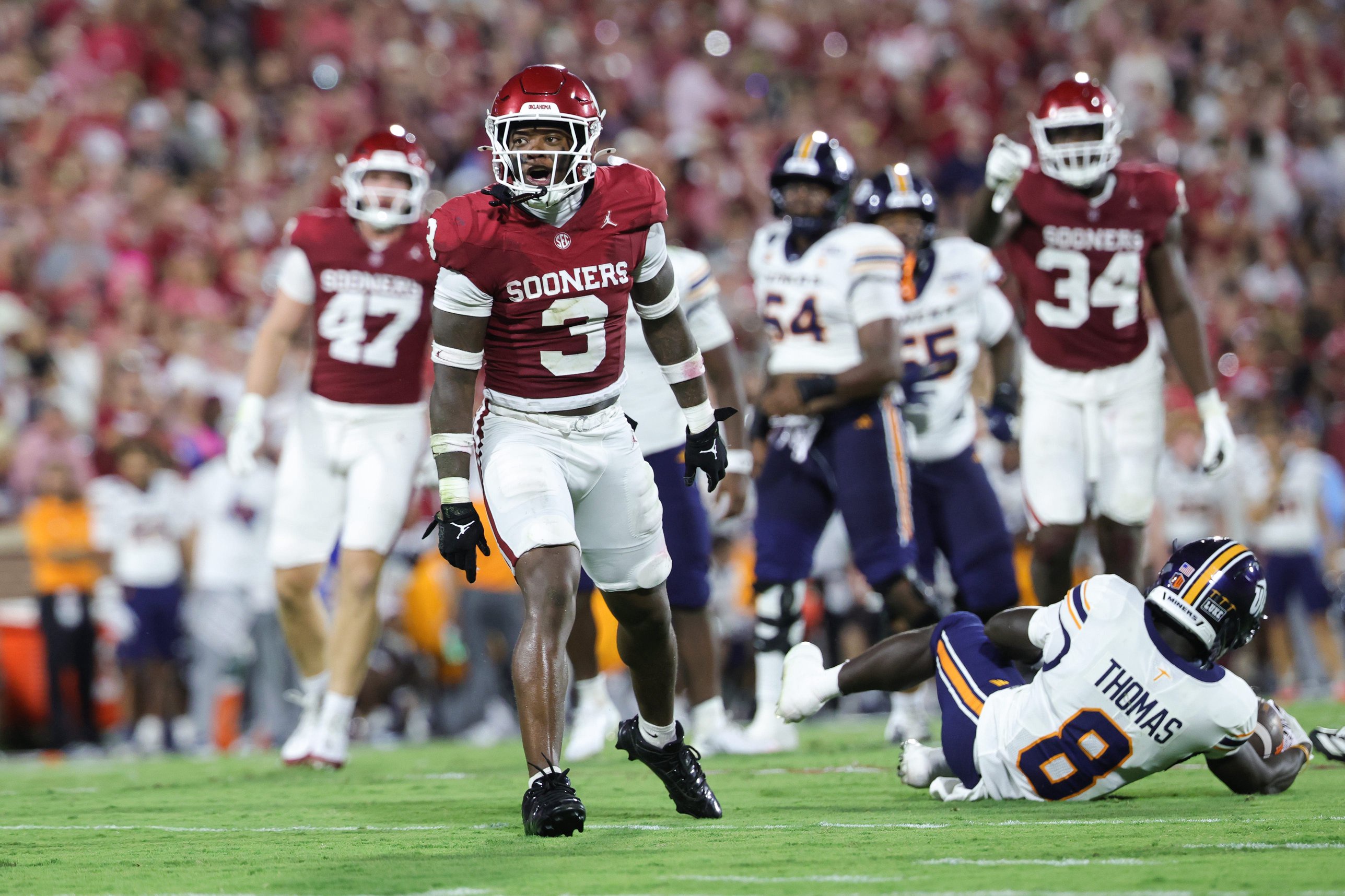 Sep 4, 2026; Norman, Oklahoma, USA;  Oklahoma Sooners defensive back Reggie Powers III (3) celebrates after making a tackle on Texas El Paso Miners wide receiver Kam Thomas (8) during the second quarter at Gaylord Family-Oklahoma Memorial Stadium.  Mandatory Credit: Kevin Jairaj-Imagn Images