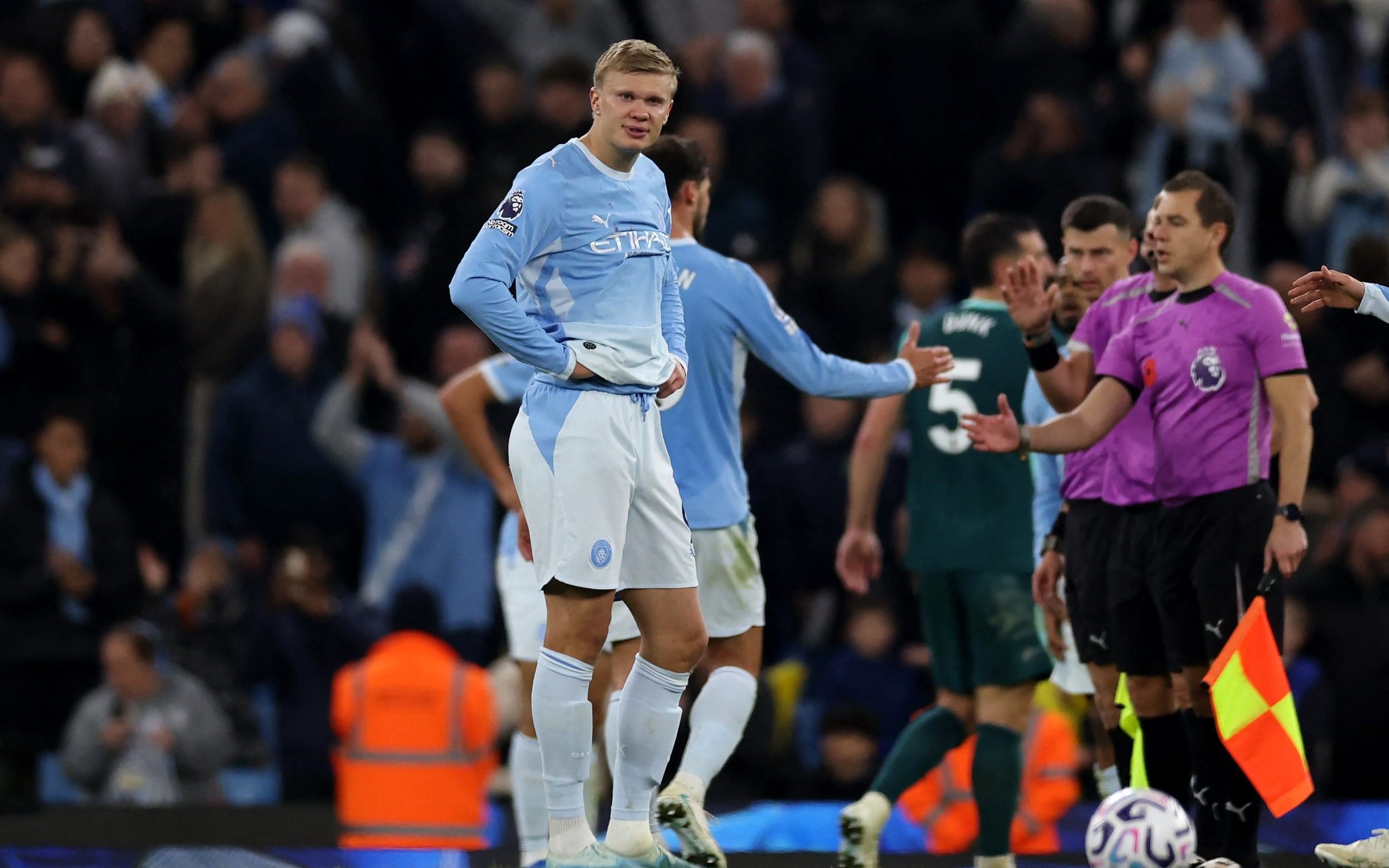 Manchester City's Norwegian striker #09 Erling Haaland reacts following the English Premier League football match between Manchester City and Brighton and Hove Albion at the Etihad Stadium in Manchester, north west England, on October 31, 2026.