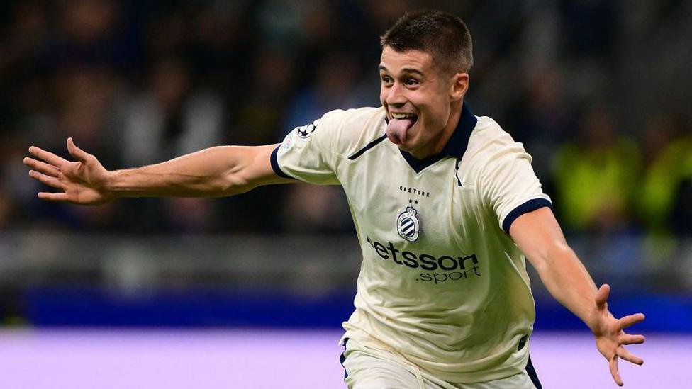 Club Brugge forward Nicolo Tresoldi celebrating scoring at Inter Milan in the Champions League