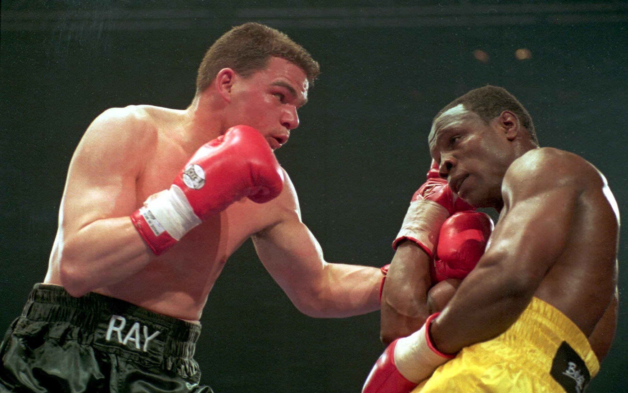 Ray Close, left, battles his way to a split decision against Chris Eubank at King's Hall, Belfast in 1994