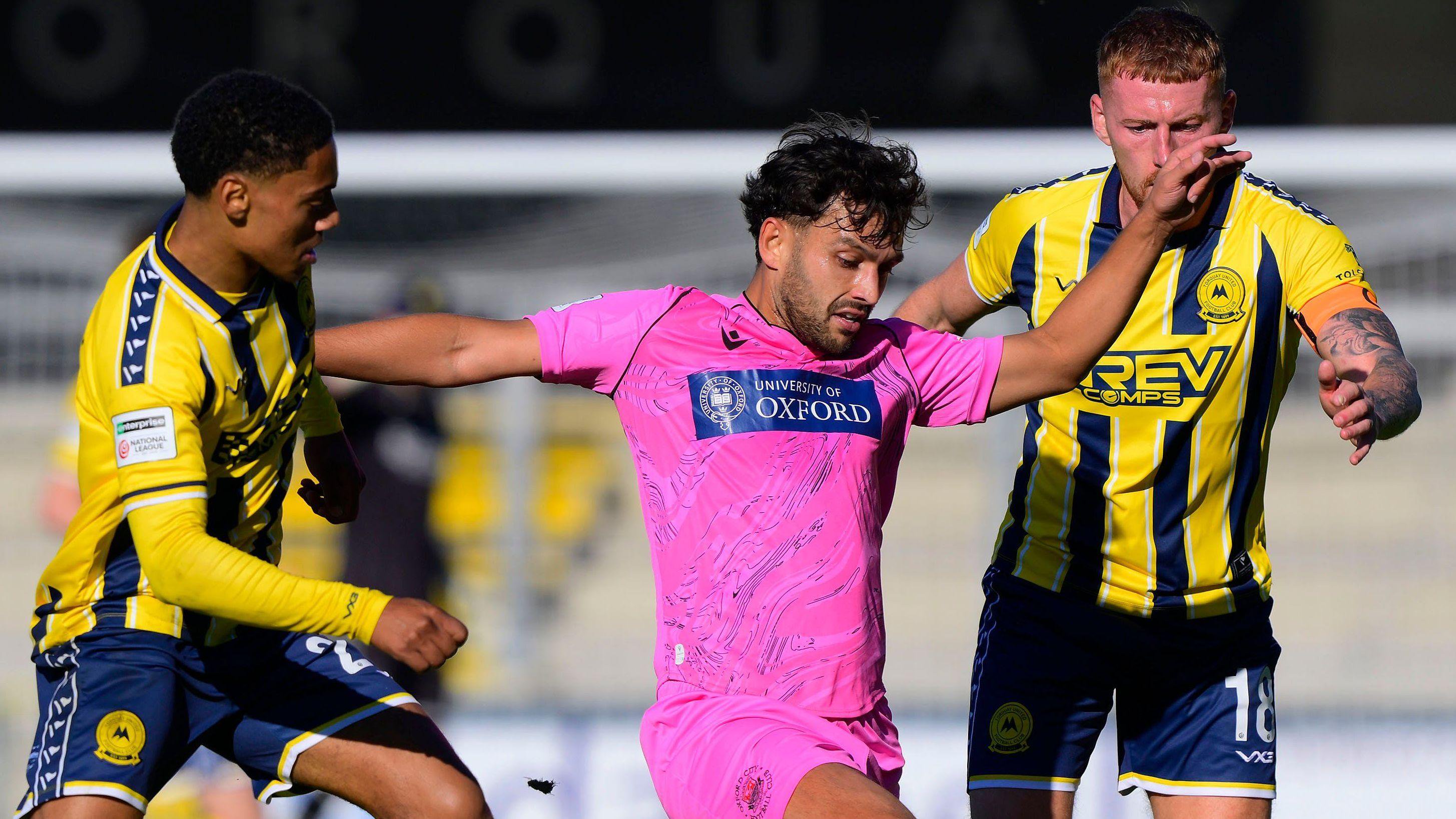 Action from Torquay United against Oxford City