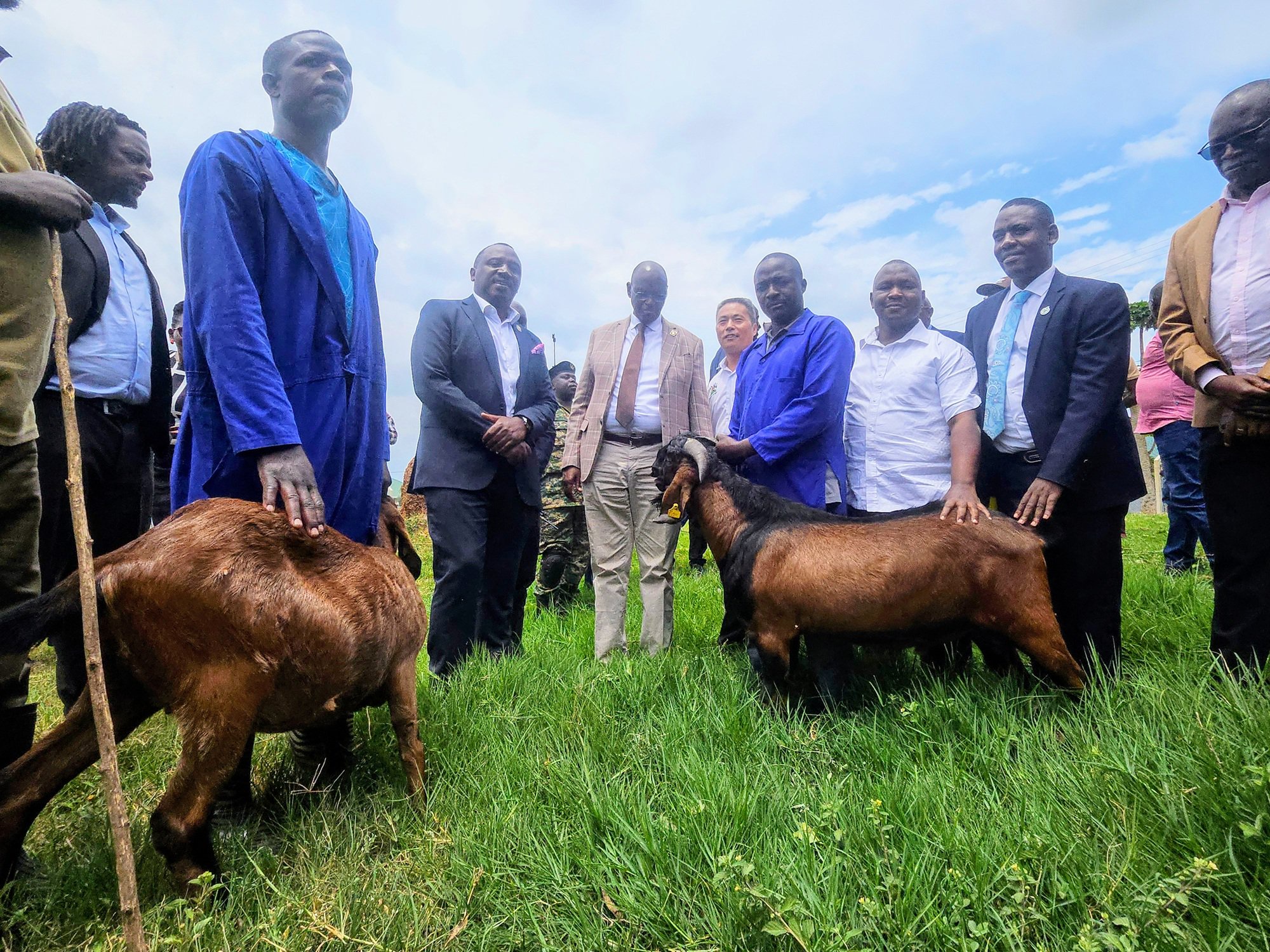 Minister Bright Rwamirama (center) presiding over the goat transfer event at NAGRC & DB in Entebbe