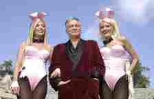 Playboy bunny Sheila Levell, Playboy founder Hugh Hefner and Playboy bunny Holly Madison pictured in 2003. (Robert Mora/Getty Images)